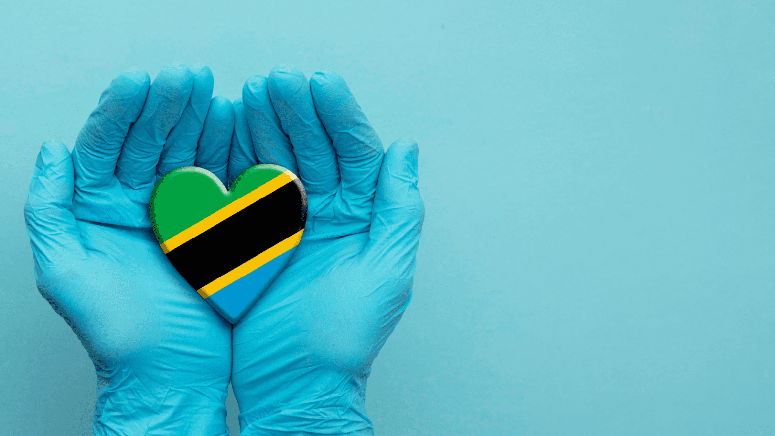 Turquoise banner shows two hands with blue latex gloes holding a heart with the Tanzanian flag colors.